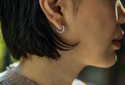 Close-up of woman looking away