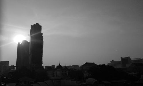 Buildings in city against sky