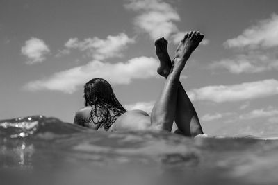 Man on beach against sky