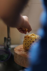 Close-up of hand holding ice cream