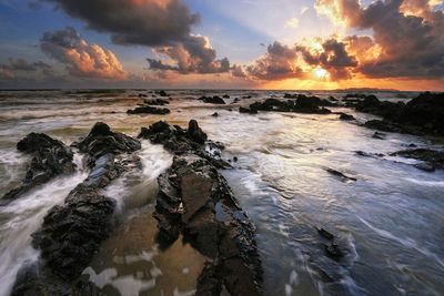 Scenic view of sea against sky during sunset