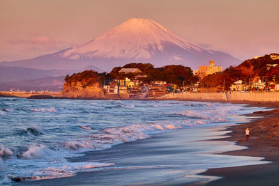 Scenic view of beach during sunrise