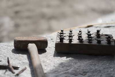 Close-up of chess pieces on wood