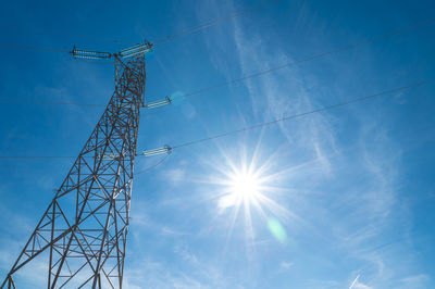 Electricity pylons in a mountain place. origin, transport and need for electricity. eletricity grid.