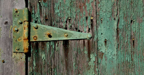 Close-up of rusty wooden door