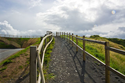 Bridge over landscape against sky