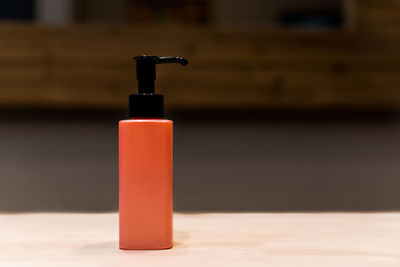 Close-up of bottle on table