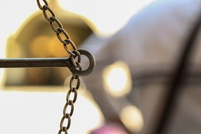 Close-up of metal tied up of chain