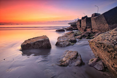 Scenic view of sea against sky during sunset