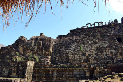 Low angle view of old building against clear sky