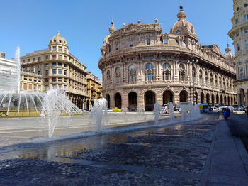 Low angle view of historical building in piazza de ferrari