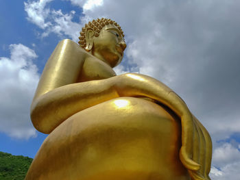 Low angle view of statue against sky