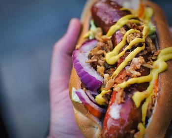 Close-up of hand holding food