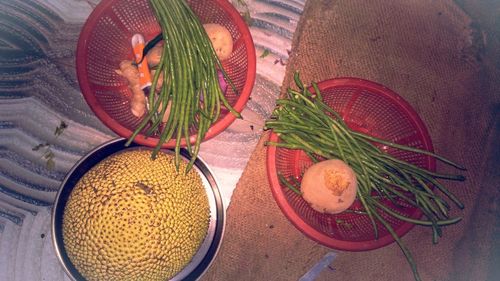 High angle view of fruits in basket on table