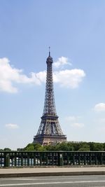 View of tower against cloudy sky