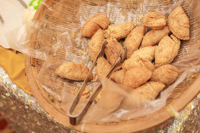 High angle view of wicker basket on table