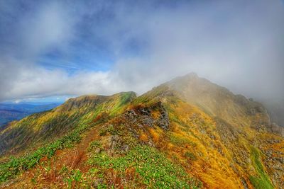 Scenic view of mountains against sky