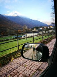 Car on mountain against sky