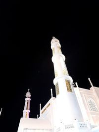 Low angle view of building against sky at night