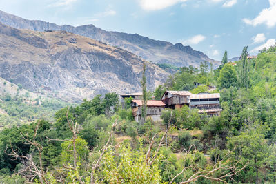 Scenic view of landscape and mountains against sky