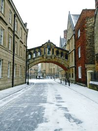 View of buildings in city during winter