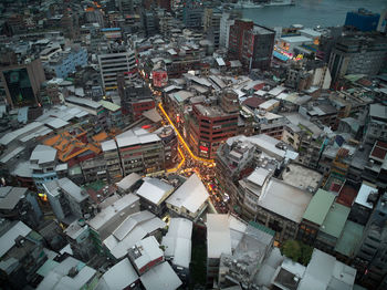 High angle view of street and buildings in city