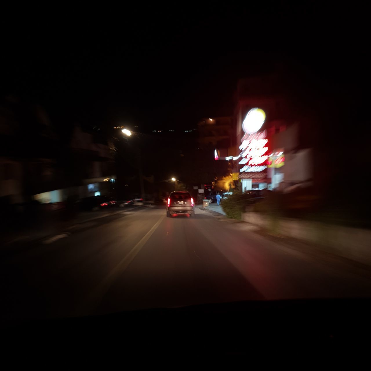 TRAFFIC ON ROAD AT NIGHT