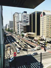 High angle view of traffic on road by buildings