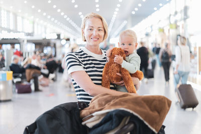 High angle view of mother and daughter at home