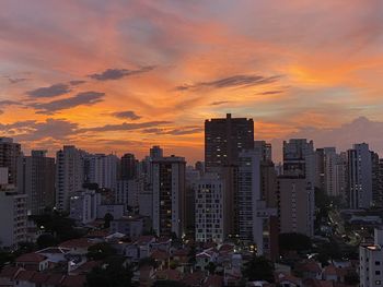 Cityscape against sky during sunset