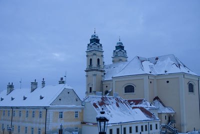 Low angle view of church against clear blue sky