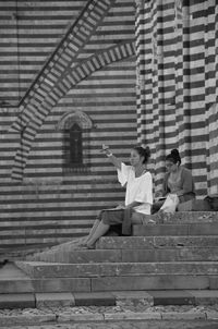 People sitting on staircase