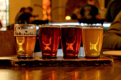 Close-up of beer glass on table