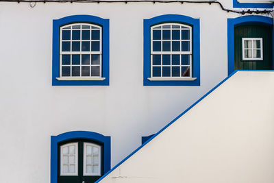 White building against blue sky