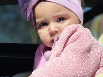 Portrait of baby girl wearing headband 