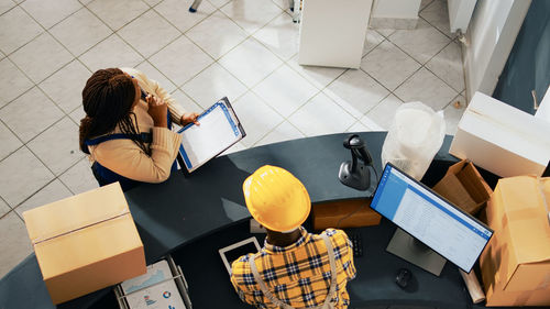 High angle view of people working in office