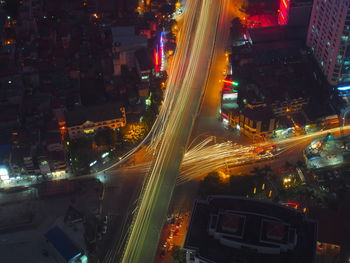 High angle view of illuminated city street at night