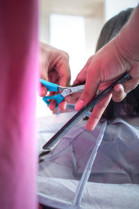 Barber with comb and scissors