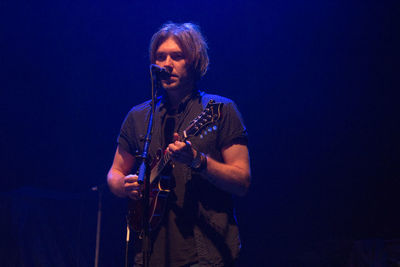 Young man playing guitar