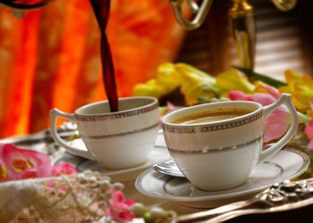 Close-up of tea cup on table