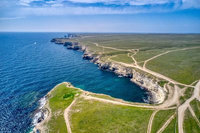 High angle view of sea shore against sky