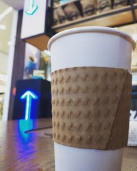 Close-up of coffee cup on table