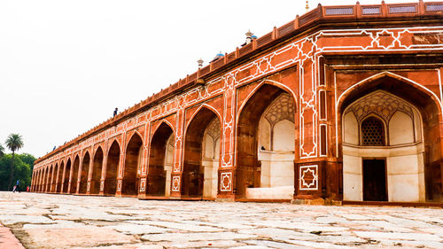 Exterior of historic building against clear sky