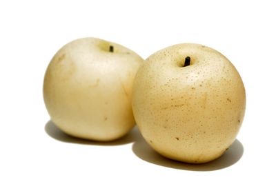 Close-up of apple against white background