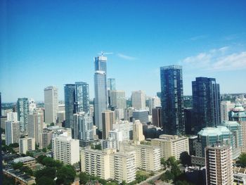 Urban skyline against clear sky