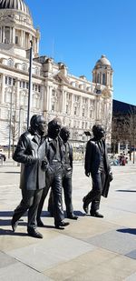 Group of people in front of building