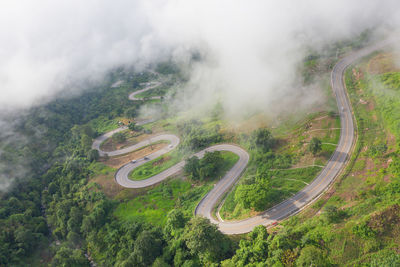 High angle view of winding road on landscape