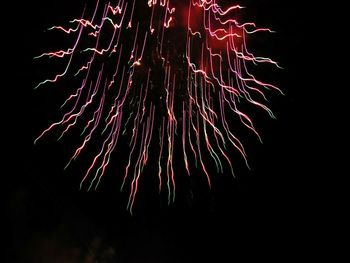 Close-up of firework display at night