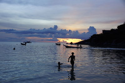 Scenic view of sea at sunset