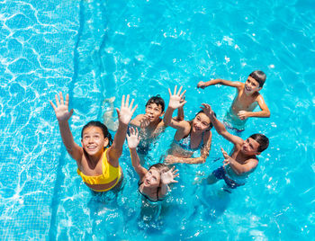 High angle view of woman swimming in pool